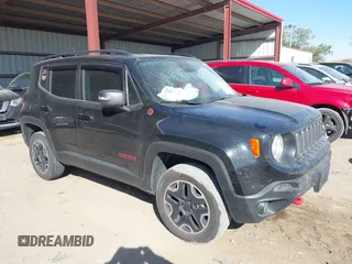 2017 Jeep Renegade Trailhawk z VIN ZACCJBCB4HPG49812, wystawiony jako IAAI lot #40494298 z przebiegiem 88 497 mil mil oraz . Historia ofert i sprzedaży dostępna na DreamBid. Obrazek 1.