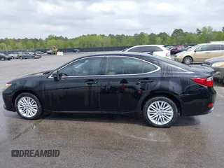 2014 Lexus ES 350 with VIN JTHBK1GG0E2096038, listed as a IAAI auction lot 41924674 with 151,312 mi miles. Bid and sale history available at carsss.com. Image 14.