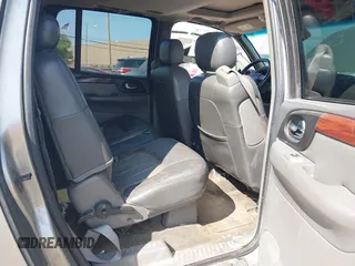 2003 GMC Envoy SLT with VIN 1GKES16S336101568, listed as a IAAI auction lot 40187998 with 185,402 mi miles. Bid and sale history available at carsss.com. Image 8.