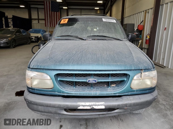 1998 Ford Explorer Sport with VIN 1FMYU22X4WUB36948, listed as a Copart auction lot 76699374 with 266,977 mi miles and Salvage title. Bid and sale history available at DreamBid. Image 5.