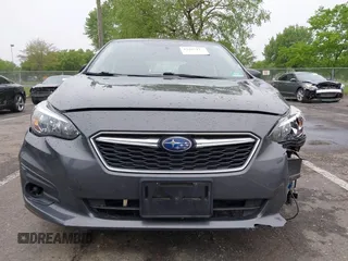 2019 Subaru Impreza with VIN 4S3GTAA69K1711062, listed as a IAAI auction lot 42187136 with 91,423 mi miles and . Bid and sale history available at DreamBid. Image 12.