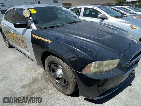 2012 Dodge Charger Police with VIN 2C3CDXAG0CH295515, listed as a Copart auction lot 51870315 with 128,837 mi miles and Clean Title. Bid and sale history available at carsss.com. Image 1.