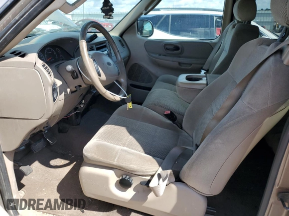 2002 Ford F-150 XL с VIN 1FTRX18L52NB25220, выставлен на аукционе Copart как лот 58202165 с пробегом 298 885 миль миль и Списание • Salvage title. История ставок и продаж доступна на DreamBid. Изображение 7.