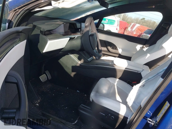 2022 Tesla Model X Plaid z VIN 7SAXCBE69NF343318, wystawiony jako IAAI lot #41387403 z przebiegiem Nie podano mil oraz . Historia ofert i sprzedaży dostępna na DreamBid. Obrazek 5.