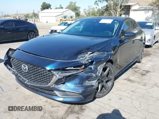 2021 Mazda 3 S with VIN JM1BPAALXM1326956, listed as a IAAI auction lot 42304248 with 55,104 mi miles and . Bid and sale history available at DreamBid. Image 23.
