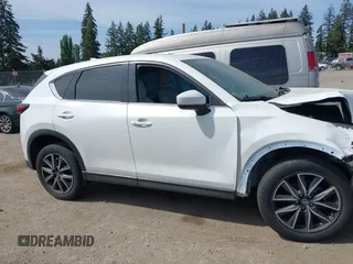 2018 Mazda CX-5 Grand Touring with VIN JM3KFBDM1J0309260, listed as a IAAI auction lot 42247237 with Not Provided miles and . Bid and sale history available at DreamBid. Image 13.