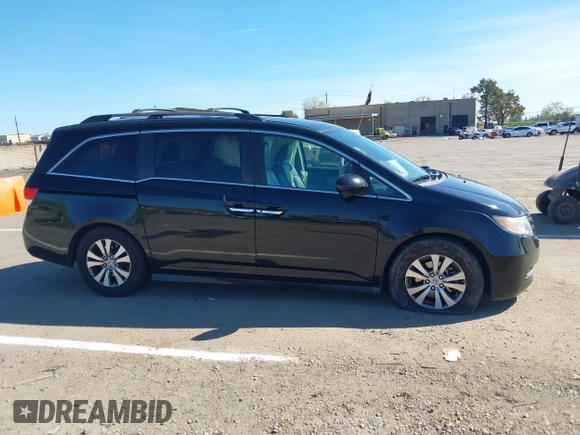 2015 Honda Odyssey EX-L with VIN 5FNRL5H68FB079528, listed as a IAAI auction lot 41893783 with 90,371 mi miles and . Bid and sale history available at DreamBid. Image 13.