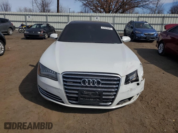 2014 Audi A8 3.0T z VIN WAURGAFD5EN007438, wystawiony jako Copart lot #47979945 z przebiegiem 147 236 mil mil oraz Szkody całkowita. Historia ofert i sprzedaży dostępna na DreamBid. Obrazek 5.