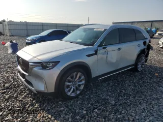 2024 Mazda CX-90 Premium z VIN JM3KKDHDXR1165117, wystawiony jako Copart lot #58350355 z przebiegiem 30 695 mil mil oraz Czysty tytuł • Clean title. Historia ofert i sprzedaży dostępna na DreamBid. Obrazek 1.