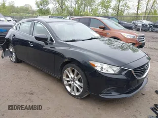 2015 Mazda 6 i Touring with VIN JM1GJ1V66F1164872, listed as a IAAI auction lot 42199518 with 193,696 mi miles and . Bid and sale history available at DreamBid. Image 1.