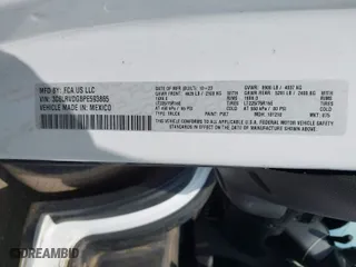 2023 Ram ProMaster Cargo Van with VIN 3C6LRVDG8PE593865, listed as a IAAI auction lot 42087540 with 49,772 mi miles. Bid and sale history available at carsss.com. Image 9.