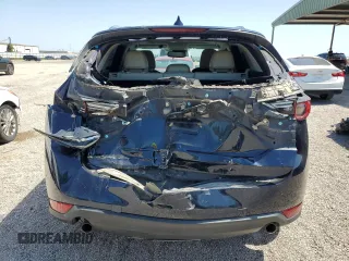 2018 Mazda CX-5 Grand Touring с VIN JM3KFBDM8J0344328, выставлен на аукционе Copart как лот 57665175 с пробегом 131 175 миль миль и Списание • Salvage title. История ставок и продаж доступна на DreamBid. Изображение 6.