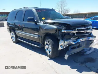2003 Chevrolet Tahoe LS with VIN 1GNEC13T23R250680, listed as a IAAI auction lot 41860092 with 216,675 mi miles. Bid and sale history available at carsss.com. Image 1.