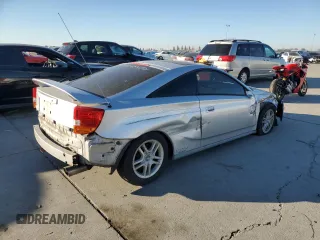 2000 Toyota Celica GT with VIN JTDDR32T1Y0046786, listed as a Copart auction lot 82707594 with 201,791 mi miles and Salvage Title. Bid and sale history available at carsss.com. Image 3.