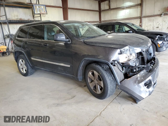 2011 Jeep Grand Cherokee Laredo with VIN 1J4RR4GG6BC657808, listed as a Copart auction lot 55255685 with 86,941 mi miles and Salvage title. Bid and sale history available at DreamBid. Image 4.