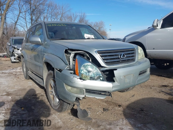 2003 Lexus GX 470 with VIN JTJBT20XX30015034, listed as a IAAI auction lot 41386690 with 234,983 mi miles. Bid and sale history available at carsss.com. Image 6.