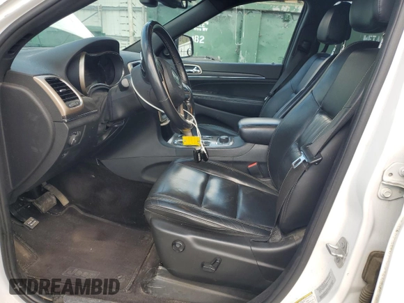 2016 Jeep Grand Cherokee Limited 75th Anniversary with VIN 1C4RJFBT6GC436472, listed as a Copart auction lot 53052795 with 223,570 mi miles and Salvage Title. Bid and sale history available at DreamBid. Image 7.