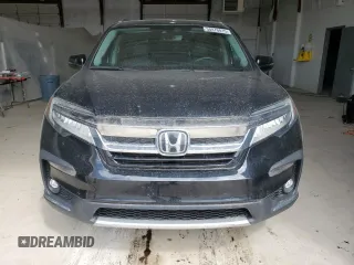 2021 Honda Pilot Touring 8-Passenger with VIN 5FNYF6H97MB062638, listed as a Copart auction lot 50876815 with 49,662 mi miles and Salvage title. Bid and sale history available at DreamBid. Image 5.
