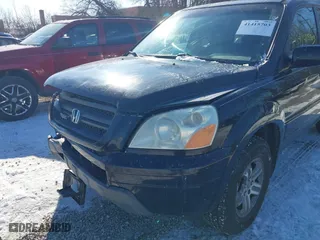 2004 Honda Pilot EX with VIN 2HKYF18544H574133, listed as a IAAI auction lot 41415703 with 217,539 mi miles. Bid and sale history available at carsss.com. Image 6.