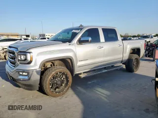 2018 GMC Sierra 1500 SLT z VIN 3GTU2NEC2JG367958, wystawiony jako Copart lot #52582495 z przebiegiem 106 703 mil mil oraz Czysty tytuł • Clean title. Historia ofert i sprzedaży dostępna na DreamBid. Obrazek 1.