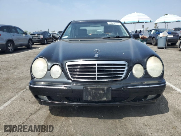 2002 Mercedes-Benz E-Class with VIN WDBJF82JX2X064384, listed as a Copart auction lot 53058325 with 188,440 mi miles and Salvage Title. Bid and sale history available at carsss.com. Image 5.