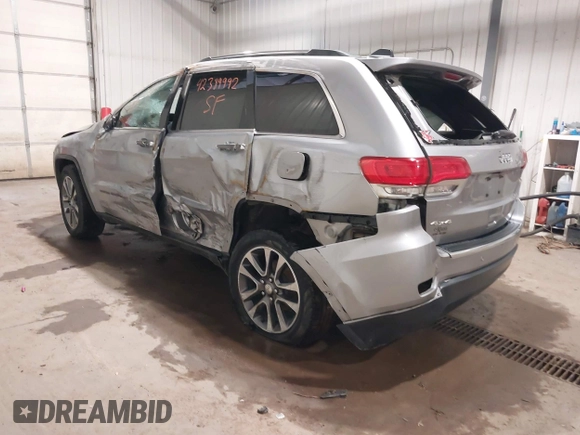 2018 Jeep Grand Cherokee Limited z VIN 1C4RJFBG1JC204615, wystawiony jako IAAI lot #42389992 z przebiegiem 98 335 mil mil oraz . Historia ofert i sprzedaży dostępna na DreamBid. Obrazek 3.