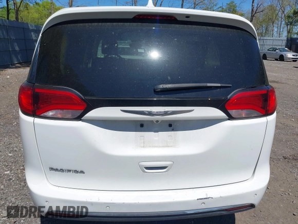 2017 Chrysler Pacifica Touring L with VIN 2C4RC1BG0HR821230, listed as a IAAI auction lot 42158120 with 98,354 mi miles and . Bid and sale history available at DreamBid. Image 16.