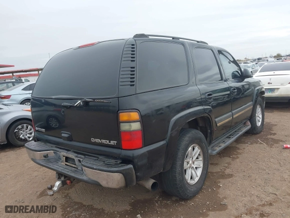 2005 Chevrolet Tahoe LT with VIN 1GNEC13T25R195635, listed as a IAAI auction lot 41581082 with 353,913 mi miles. Bid and sale history available at carsss.com. Image 4.