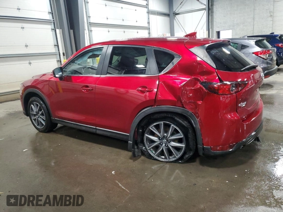 2018 Mazda CX-5 Touring z VIN JM3KFBCM5J0462676, wystawiony jako Copart lot #57892015 z przebiegiem 76 566 mil mil oraz Szkoda całkowita • Salvage title. Historia ofert i sprzedaży dostępna na DreamBid. Obrazek 2.
