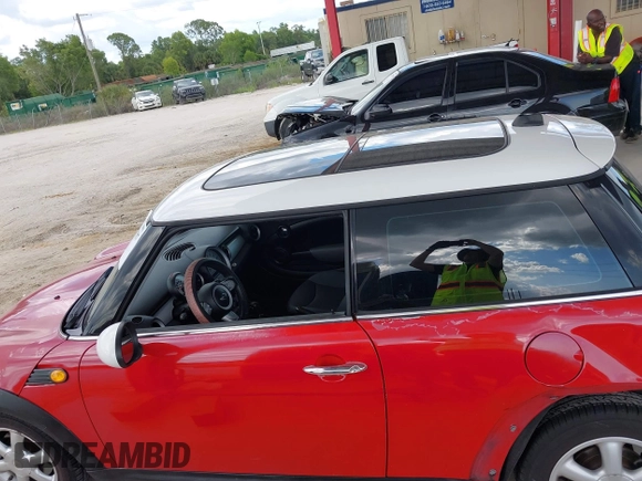 2010 MINI Hardtop with VIN WMWMF3C59ATZ66935, listed as a IAAI auction lot 42519507 with 132,334 mi miles and . Bid and sale history available at DreamBid. Image 14.
