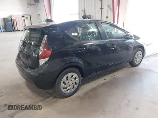 2016 Toyota Prius c One with VIN JTDKDTB3XG1124674, listed as a IAAI auction lot 41976438 with 72,028 mi miles. Bid and sale history available at carsss.com. Image 4.