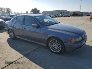 2001 BMW 5 Series 540i with VIN WBADN53421GC96565, listed as a Copart auction lot 83236524 with 149,650 mi miles and Salvage Title. Bid and sale history available at carsss.com. Image 4.