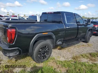 2023 GMC Sierra 3500HD Denali z VIN 1GT49WEY9PF135123, wystawiony jako Copart lot #74175484 z przebiegiem Nie podano mil oraz Nie do naprawy • Non repairable. Historia ofert i sprzedaży dostępna na DreamBid. Obrazek 3.