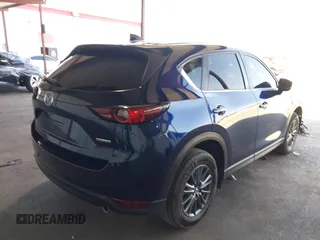 2020 Mazda CX-5 Touring z VIN JM3KFACM2L0802461, wystawiony jako IAAI lot #42148039 z przebiegiem 57 963 mil mil oraz . Historia ofert i sprzedaży dostępna na DreamBid. Obrazek 4.
