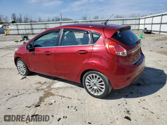 2014 Ford Fiesta Titanium z VIN 3FADP4FJ0EM156814, wystawiony jako Copart lot #52028435 z przebiegiem 97 985 mil mil oraz Szkoda całkowita • Salvage title. Historia ofert i sprzedaży dostępna na DreamBid. Obrazek 2.