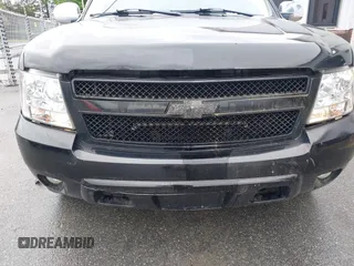 2007 Chevrolet Tahoe LT z VIN 1GNFC13077R275025, wystawiony jako IAAI lot #42255620 z przebiegiem 265 807 mil mil oraz . Historia ofert i sprzedaży dostępna na DreamBid. Obrazek 6.