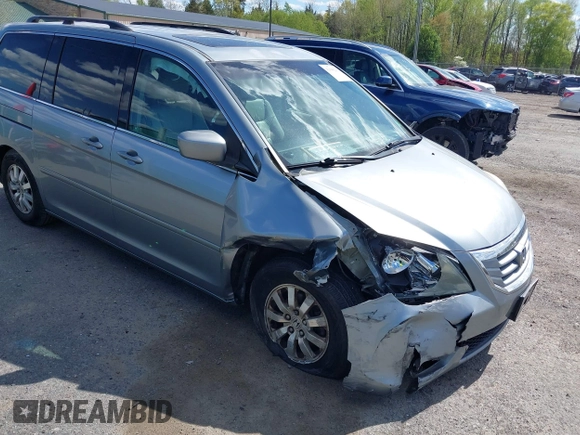2010 Honda Odyssey EX-L with VIN 5FNRL3H74AB046578, listed as a IAAI auction lot 42049213 with 218,457 mi miles. Bid and sale history available at carsss.com. Image 6.