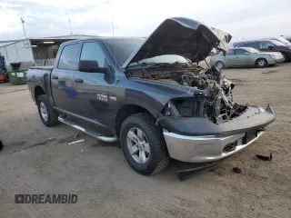 2015 Ram 1500 Tradesman with VIN 3C6RR7KT0FG631453, listed as a Copart auction lot 41441115 with 104,616 mi miles and Salvage title. Bid and sale history available at DreamBid. Image 4.