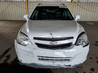 2013 Chevrolet Captiva Sport LTZ with VIN 3GNAL4EK0DS619409, listed as a Copart auction lot 82646974 with 90,590 mi miles and Salvage Title. Bid and sale history available at DreamBid. Image 5.