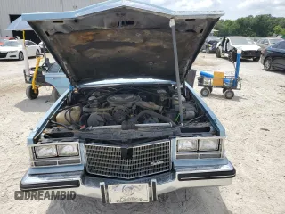 1985 Cadillac Seville z VIN 1G6KS6985FE825187, wystawiony jako Copart lot #54197375 z przebiegiem 2706 mil mil oraz Tytuł czysty. Historia ofert i sprzedaży dostępna na DreamBid. Obrazek 11.