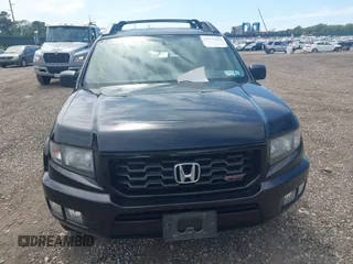 2014 Honda Ridgeline Sport with VIN 5FPYK1F71EB003710, listed as a IAAI auction lot 42777931 with 126,755 mi miles and . Bid and sale history available at DreamBid. Image 12.