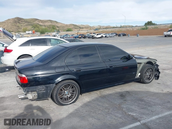 2001 BMW M5 z VIN WBSDE93421BZ99483, wystawiony jako IAAI lot #41892842 z przebiegiem 134 689 mil mil oraz . Historia ofert i sprzedaży dostępna na DreamBid. Obrazek 14.