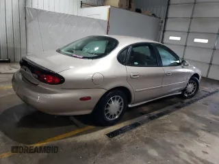 1999 Ford Taurus SE with VIN 1FAFP53S6XA242981, listed as a Copart auction lot 43211425 with 111,966 mi miles and Salvage title. Bid and sale history available at DreamBid. Image 3.