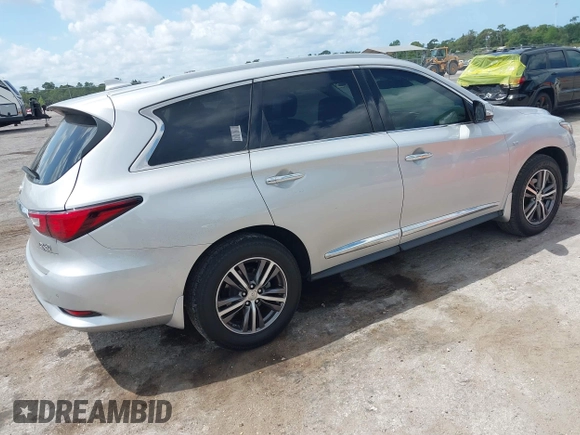 2017 Infiniti QX60 with VIN 5N1DL0MN8HC511220, listed as a IAAI auction lot 42140409 with 98,181 mi miles and . Bid and sale history available at carsss.com. Image 4.