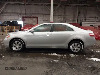 2009 Toyota Camry z VIN 4T1BE46KX9U352465, wystawiony jako IAAI lot #41518299 z przebiegiem 107 348 mil mil oraz . Historia ofert i sprzedaży dostępna na DreamBid. Obrazek 14.