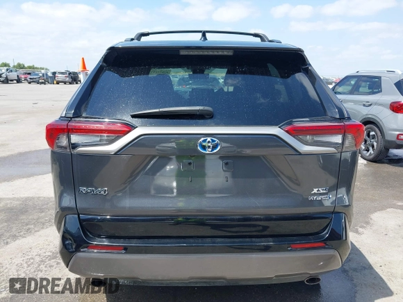2021 Toyota RAV4 Hybrid XSE with VIN 2T3E6RFV8MW026973, listed as a IAAI auction lot 42052289 with 94,857 mi miles and . Bid and sale history available at DreamBid. Image 16.