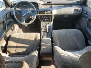 1989 Mitsubishi Galant with VIN JA3BR56V1KZ052149, listed as a Copart auction lot 69987544 with 74,232 mi miles and Salvage Title. Bid and sale history available at DreamBid. Image 8.