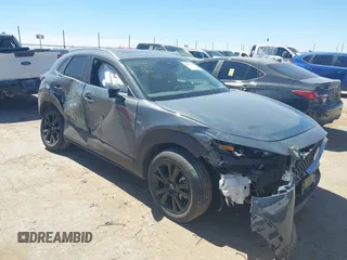 2024 Mazda CX-30 S Preferred with VIN 3MVDMBCM5RM606886, listed as a IAAI auction lot 41867949 with 15,410 mi miles and . Bid and sale history available at DreamBid. Image 1.