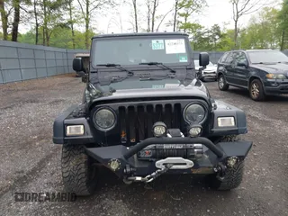 2006 Jeep Wrangler Rubicon z VIN 1J4FA69S76P749712, wystawiony jako IAAI lot #42240375 z przebiegiem 75 405 mil mil oraz . Historia ofert i sprzedaży dostępna na DreamBid. Obrazek 12.