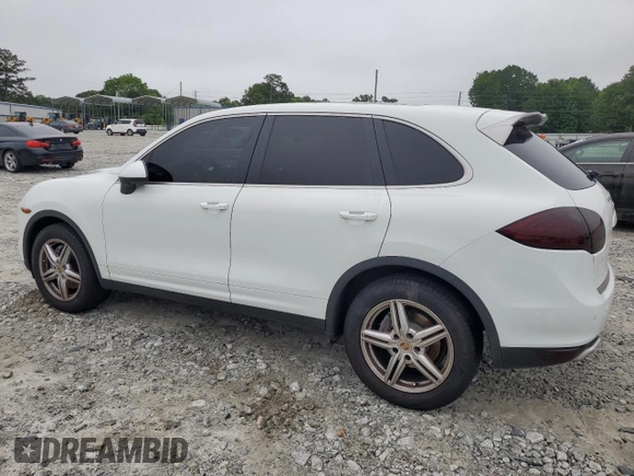 2014 Porsche Cayenne with VIN WP1AA2A21ELA95833, listed as a Copart auction lot 58572195 with 145,073 mi miles and Salvage title. Bid and sale history available at DreamBid. Image 2.